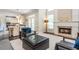 Bright living room features a fireplace, high ceilings and large windows offering ample natural light at 2296 Valley Brook Ne Way, Atlanta, GA 30319