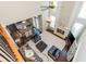 Bright living room boasts soaring ceilings, a fireplace, and ample natural light from large windows at 2296 Valley Brook Ne Way, Atlanta, GA 30319