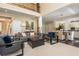 Open-concept living space with a fireplace, a dining area, and views into the kitchen, creating a cohesive layout at 2296 Valley Brook Ne Way, Atlanta, GA 30319