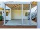 Spacious covered patio with stone flooring, offering a perfect outdoor entertaining area at 2296 Valley Brook Ne Way, Atlanta, GA 30319