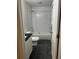 Bathroom featuring white subway tile, black tile floors, and a dark vanity at 305 Henry Aaron Sw Ave, Atlanta, GA 30310