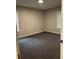 Bedroom with gray carpet, neutral walls, and natural lighting at 305 Henry Aaron Sw Ave, Atlanta, GA 30310