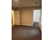 Bedroom with gray carpet and a bathroom view with white subway tile at 305 Henry Aaron Sw Ave, Atlanta, GA 30310