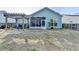 A backyard that includes a covered patio, screened-in porch and an easy-to-maintain lot at 4230 Braden Nw Ln, Kennesaw, GA 30144