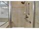 Bathroom featuring a glass shower enclosure, showerhead, and safety bars at 4230 Braden Nw Ln, Kennesaw, GA 30144