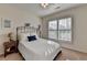 Bedroom with natural light, plantation shutters, and neutral carpet at 4230 Braden Nw Ln, Kennesaw, GA 30144