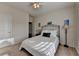 Bedroom with natural light, plantation shutters, walk-in closet, and neutral carpet at 4230 Braden Nw Ln, Kennesaw, GA 30144