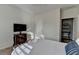 Bedroom with natural light, plantation shutters, walk-in closet, and neutral carpet at 4230 Braden Nw Ln, Kennesaw, GA 30144