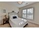 Bedroom with natural light, plantation shutters, and neutral carpet at 4230 Braden Nw Ln, Kennesaw, GA 30144