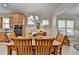 Dining room features wood floors, wooden furniture, and a view into the living room at 4230 Braden Nw Ln, Kennesaw, GA 30144