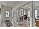 Bright hallway with a view through French doors into an office space at 4230 Braden Nw Ln, Kennesaw, GA 30144