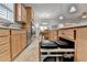 Kitchen island with integrated bins and a breakfast bar for convenient meal prep and casual dining at 4230 Braden Nw Ln, Kennesaw, GA 30144