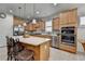 Modern kitchen with stainless steel appliances, a center island, and plenty of cabinet space at 4230 Braden Nw Ln, Kennesaw, GA 30144