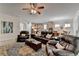 Open concept living area with views of the kitchen, dining area, and an ample amount of natural light at 4230 Braden Nw Ln, Kennesaw, GA 30144