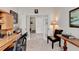 Office featuring a desk, chair, and storage, with a view of the hallway at 4230 Braden Nw Ln, Kennesaw, GA 30144