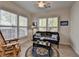 Sun room with lots of natural light, plantation shutters, and wood floor at 4230 Braden Nw Ln, Kennesaw, GA 30144