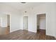 Spacious bedroom featuring sleek wood flooring and access to an ensuite bathroom and walk-in closet at 1101 Juniper Ne St # 1511, Atlanta, GA 30309