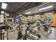 Community gym with cardio machines, free weights, and mounted televisions at 1101 Juniper Ne St # 1511, Atlanta, GA 30309