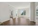 Spacious living room with hardwood floors and a large window that provides natural light at 1101 Juniper Ne St # 1511, Atlanta, GA 30309