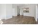 Open-concept living space features a kitchen with stainless steel appliances, and hardwood floors at 1101 Juniper Ne St # 1511, Atlanta, GA 30309