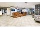 Welcoming lobby with modern finishes, a reception desk, tile floors and contemporary lighting at 1101 Juniper Ne St # 1511, Atlanta, GA 30309