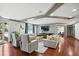 A modern lounge featuring hardwood floors, stylish seating, and a large television for residents to unwind and socialize at 1101 Juniper Ne St # 1511, Atlanta, GA 30309
