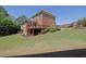 Expansive backyard with a wooden deck, ideal for outdoor entertaining at 2450 Weber Heights Way, Buford, GA 30519