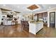 Spacious kitchen with granite countertops, stainless steel appliances, and breakfast bar at 2450 Weber Heights Way, Buford, GA 30519