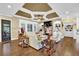 Cozy living room with a fireplace, built-in shelving, and plenty of natural light at 2450 Weber Heights Way, Buford, GA 30519