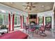 Cozy sunroom with brick fireplace, tile floor and plenty of natural light at 2450 Weber Heights Way, Buford, GA 30519