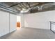 Large carpeted bedroom featuring exposed ductwork, ceiling fan, and access to an ensuite bathroom at 264 19Th Nw St # 2308, Atlanta, GA 30363