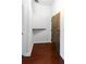 Entryway features hardwood floors, a white shelf, and modern door with multiple locks at 264 19Th Nw St # 2308, Atlanta, GA 30363