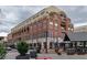 Brick apartment building featuring ground-level retail space in a vibrant urban setting at 264 19Th Nw St # 2308, Atlanta, GA 30363