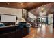 Finished basement with movie screen, game table, and sitting area at 290 Ardsley Ln, Alpharetta, GA 30005