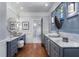 Elegant bathroom with custom vanity, marble countertop and flooring, and a walk-in shower at 290 Ardsley Ln, Alpharetta, GA 30005