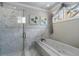 Luxurious bathroom showcasing a soaking tub and separate walk-in shower at 290 Ardsley Ln, Alpharetta, GA 30005