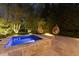 Hot tub area with stylish hanging chairs and a gas fire pit offering a luxurious outdoor experience at 290 Ardsley Ln, Alpharetta, GA 30005