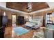 Spacious primary suite with wood ceiling, hardwood floors, and an en-suite bathroom at 290 Ardsley Ln, Alpharetta, GA 30005