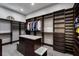 Walk-in closet with custom shelving and drawers for ample storage at 290 Ardsley Ln, Alpharetta, GA 30005