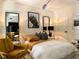 Bedroom with a bed, side tables, wall art and lighting fixture at 4836 Se Merriman Se Walk # 23, Smyrna, GA 30080