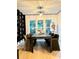 Bright dining room with seating for ten, wood floors, and artistic decor at 4836 Se Merriman Se Walk # 23, Smyrna, GA 30080