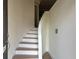 Bright entryway features hardwood floors, white stairs, and minimalist design at 4836 Se Merriman Se Walk # 23, Smyrna, GA 30080