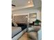 Comfortable main bedroom with a large bed, modern lighting, and stylish decor at 4836 Se Merriman Se Walk # 23, Smyrna, GA 30080