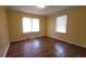 Bedroom featuring hardwood floors and natural light at 340 Adelle Se St, Atlanta, GA 30315