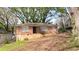Cozy brick home featuring mature shade trees and a classic design in a quiet residential neighborhood at 340 Adelle Se St, Atlanta, GA 30315