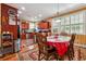 Eat-in kitchen area boasting natural light, wood cabinets, and stainless steel appliances at 3560 Glen Summit Ln, Snellville, GA 30039