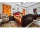 Spacious main bedroom with trey ceilings, decorative curtains, and a cozy sitting area at 3560 Glen Summit Ln, Snellville, GA 30039