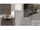 Flooring 1 featuring stone collection at 538 Sawnee Village Blvd # D67, Cumming, GA 30040