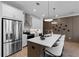 Modern kitchen featuring stainless steel appliances, a large island, and pendant lighting at 538 Sawnee Village Blvd # D67, Cumming, GA 30040