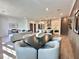 Spacious open-concept living area, dining area, and modern kitchen at 538 Sawnee Village Blvd # D67, Cumming, GA 30040